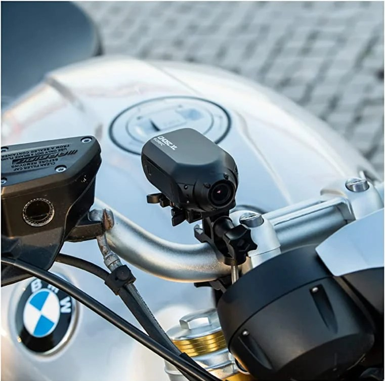 BMW motorcycle with a Ghost XL Drift camera held on the handle bars with a mount.