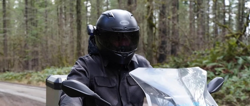Motorcyclist wearing as Bell Helmet with a Ghost XL Pro Helmet Camera on the side.